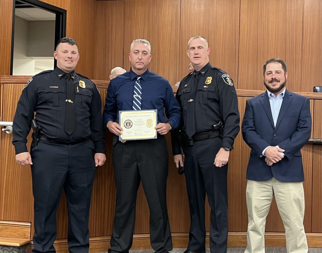 John Mahler, a former CPD officer and State Trooper, returned to become patrol major. Left to right are Assistant Chief Brandon Patterson, Major John Mahler, Chief Joey Duncan and Councilman Brad Smith. (W.C. Mann for The Cullman Tribune)